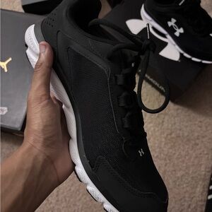 Under Armour Black and White Athletic Shoes Sleek Design